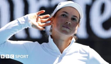 Yulia Putintseva points to the crowd after reaching the Australian Open fourth round