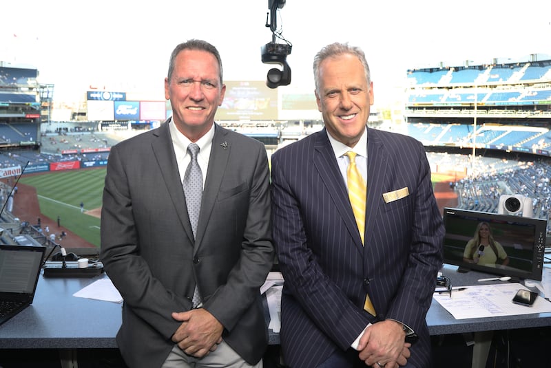 David Cone (left) and Michael Kay broadcast a game on YES Network from Yankee Stadium.