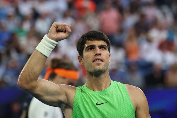 Carlos Alcaraz of Spain celebrates a point against Alexander Zverev.