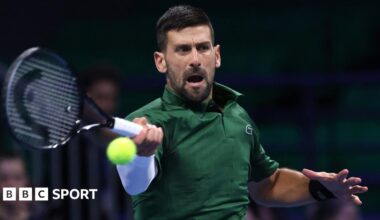 Luke Littler celebrates winning the 2026 PDC World Championship as tickertape falls