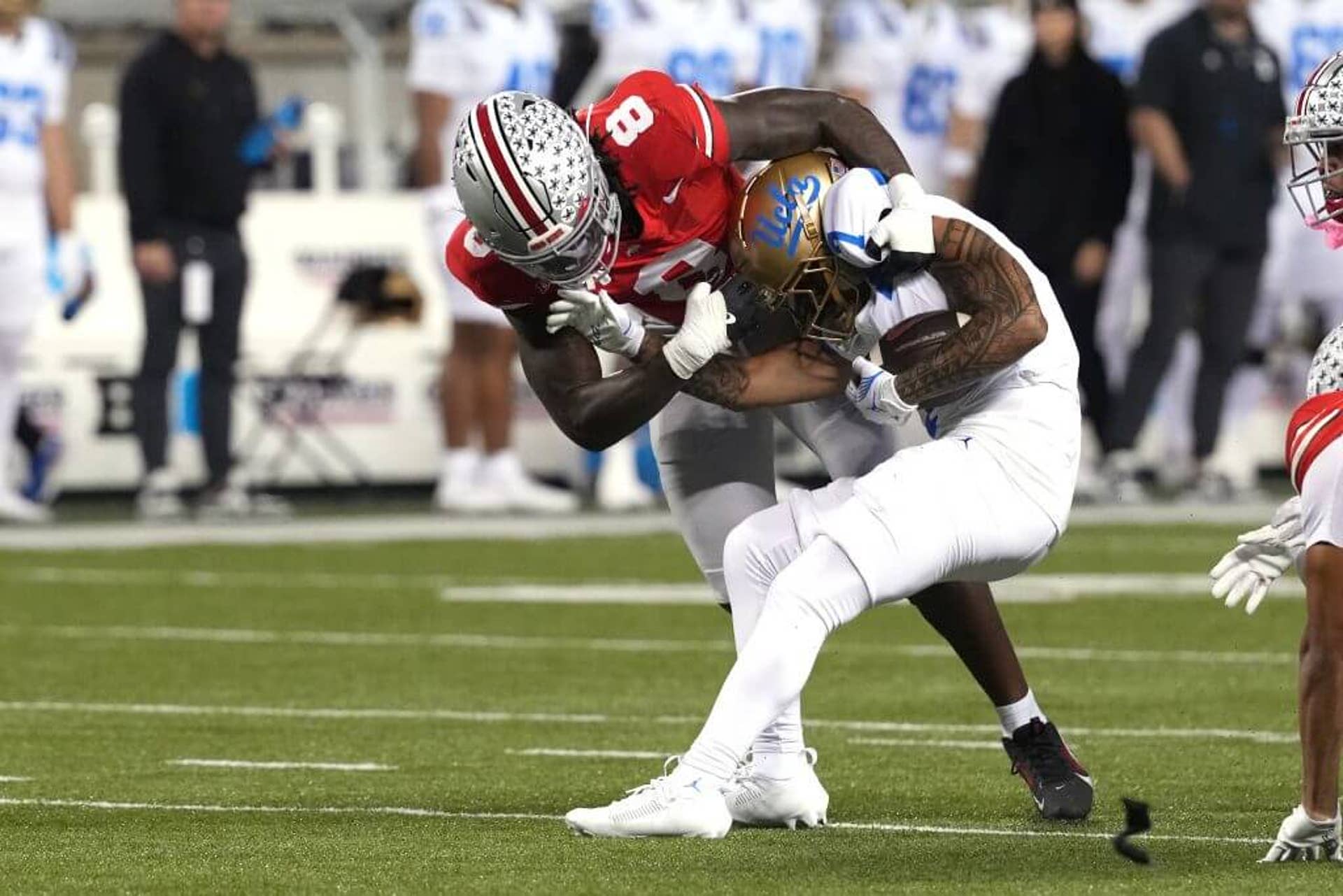 Ohio State linebacker Arvell Reese makes a tackle against UCLA