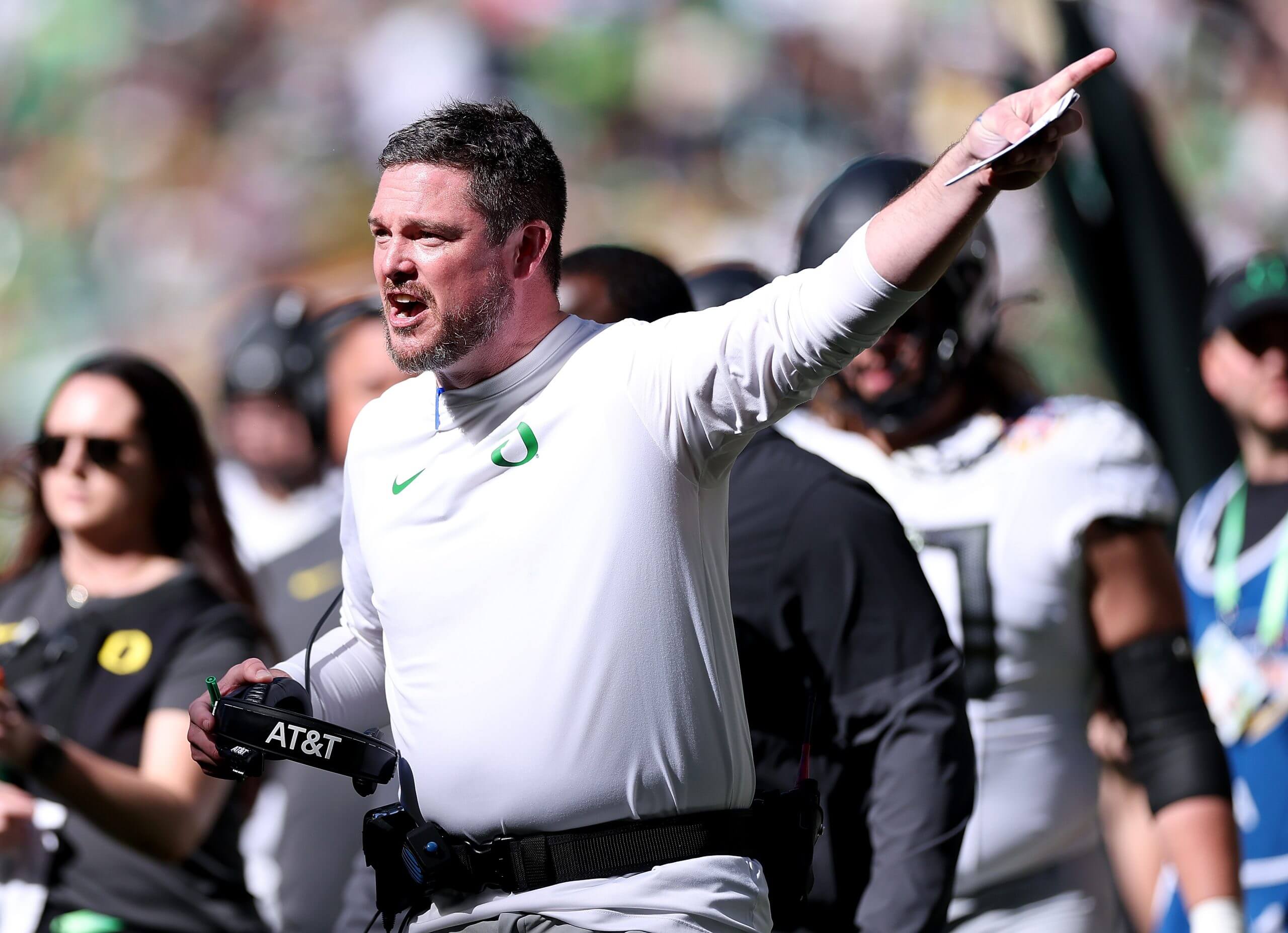 Dan Lanning gestures on the sideline. 