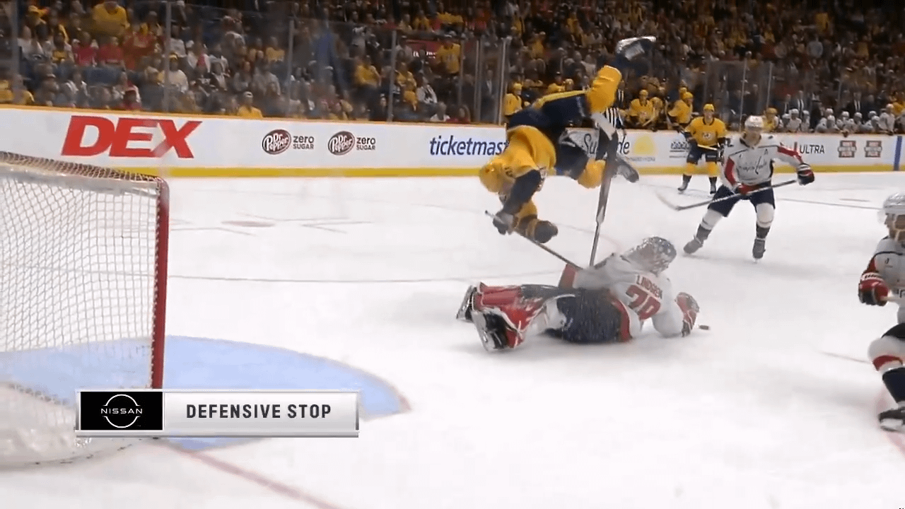 Steven Stamkos does a dive roll over Charlie Lindgren after Lindgren came out to poke check him.