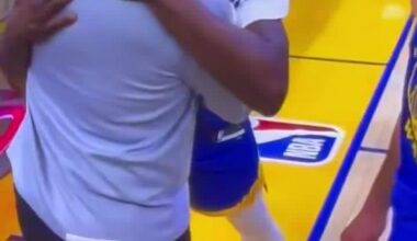 Mike Brown hugging Draymond post game