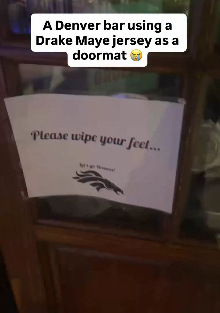 A Denver bar using a Drake Maye jersey as a doormat...