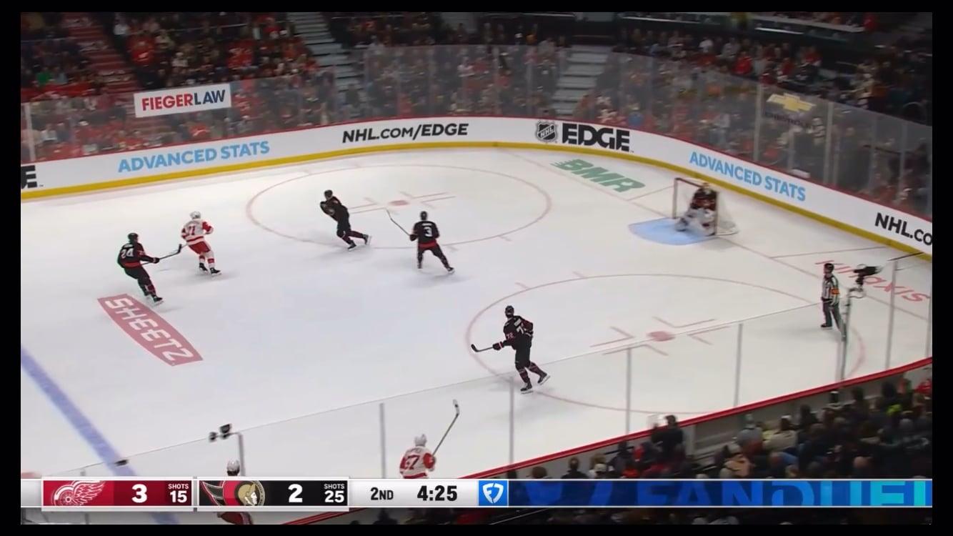 Raymond toe drags, snipes and scores to put the Wings back up by 2