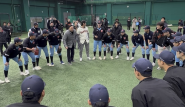 Jung Hoo Lee joins players from his alma mater, Whimoon High School, in their team cheer