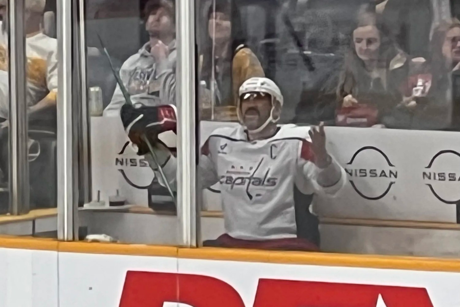 Alex Ovechkin, palms raised upward in penalty box