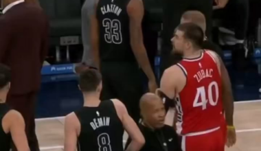 John Collins pushes Egor Dëmin after he tries to pick up James Harden after a foul. Terance Mann intervenes.