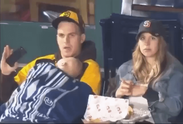 Daddy appears on jumbotron and tells the crowd to be quiet and not wake up his baby.