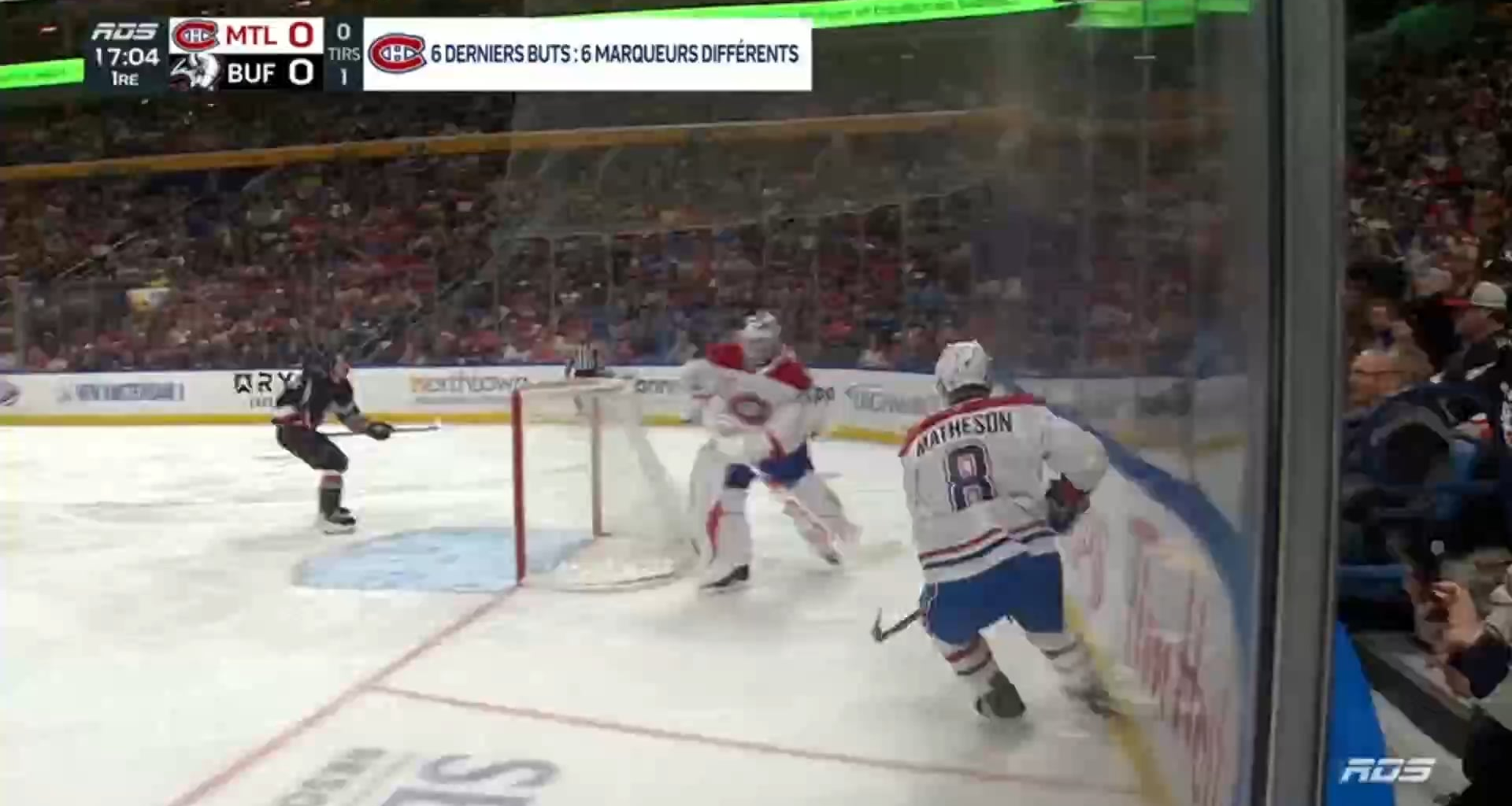 Cole Caufield gets his own rebound and roofs it to open the scoring in Buffalo
