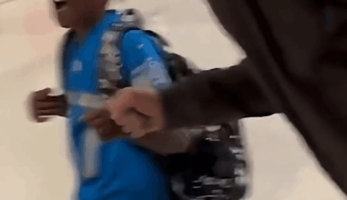 [Highlight] Aidan Hutchinson surprises a kid wearing his jersey at the airport