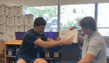 Fernando Mendoza reading to bilingual Berkeley kids early in his Cal career