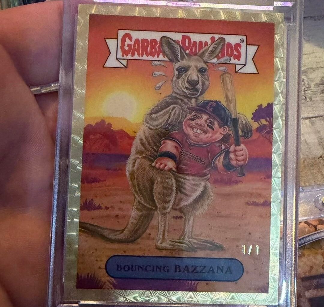Anyone know if Travis is a card collector? My son pulled this and wanted to give him first crack at this
