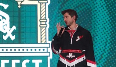 Connor McKnight modeling 90s City Connect Jacket promo at SoxFest