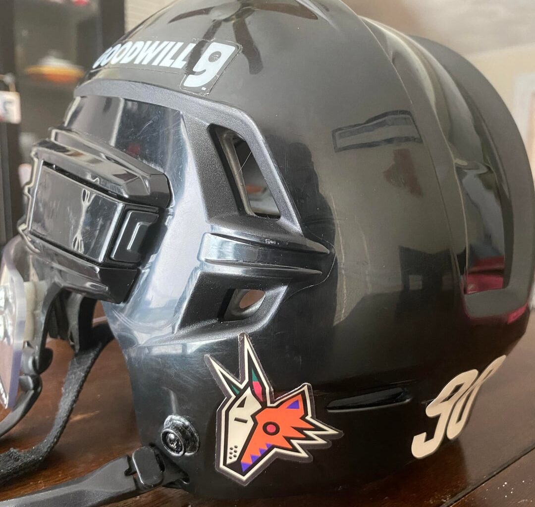 Game used JJ Moser helmet