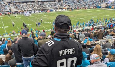 Quintin Morris's dad holding the game ball from his son's TD catch, also TLaw's 38th TD of the season making him the franchise's single-season leader in total TDs