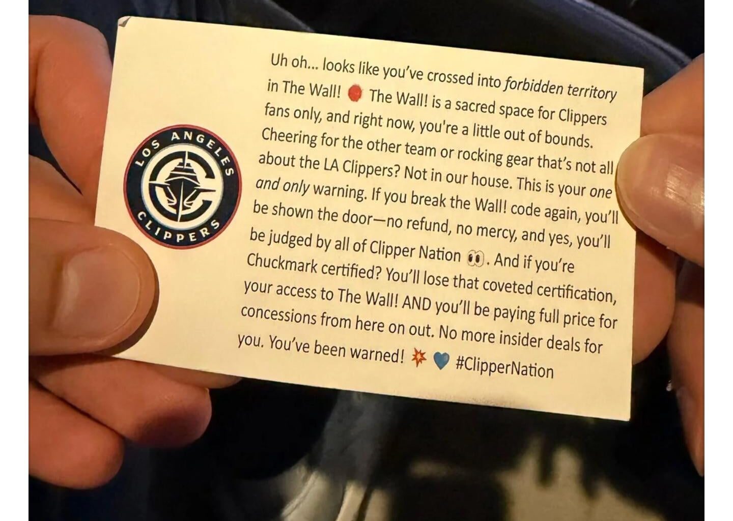 This can't be Real? "This is the notice you receive if you try to wear a Lakers jersey in the Clippers' Wall fan section, from last night's game"