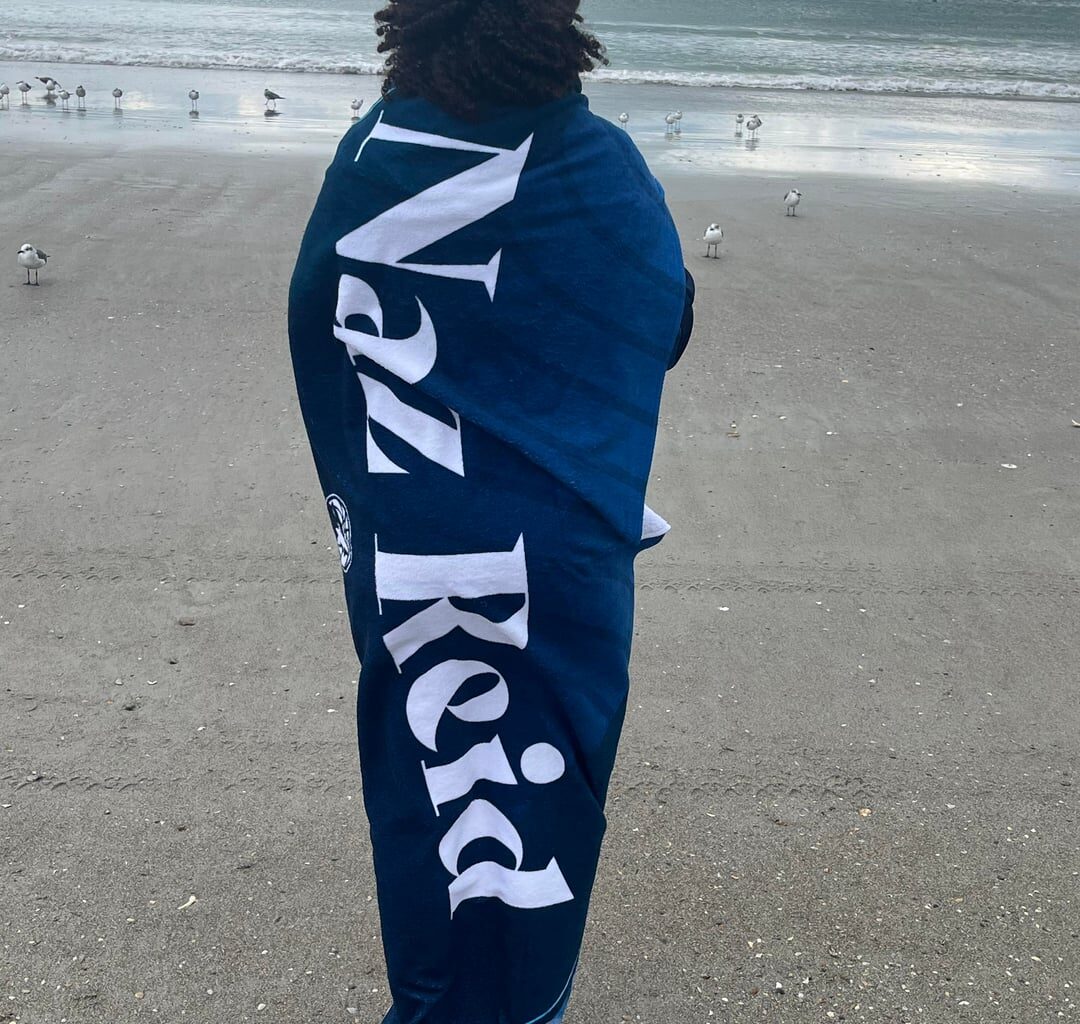 Me and my Naz Reid towel vs the windy beach