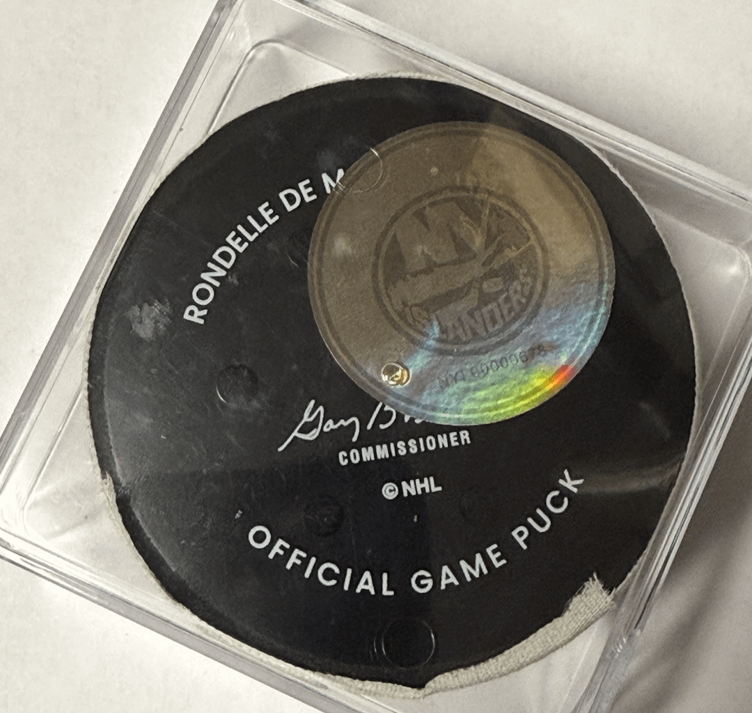 Stoked to land this game-used Islanders puck: Matthew Schaefer NHL Home Debut & 1st Start. Made his 1st pass on home ice with this puck (1st @ 19:55) and would later scored his career 1st goal in this game.
