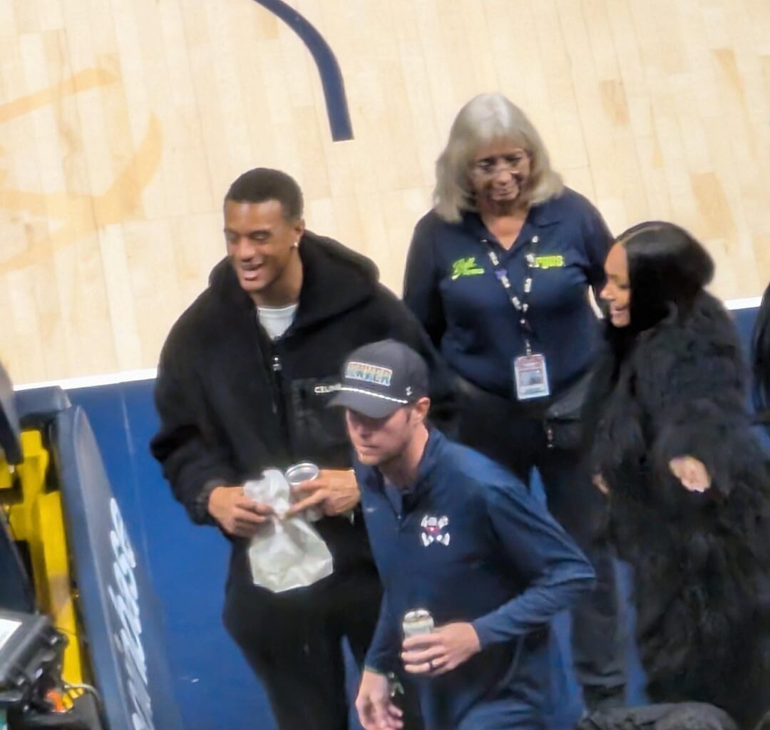 Pat Surtain at the Nuggets game tonight 🧡💙🤍💛
