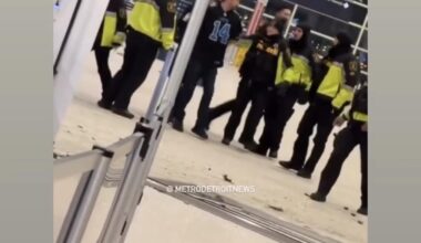 Amon-Ra St. Brown reaction to someone crashing into the McNamara terminal at Detroit Metro Airport wearing his jersey