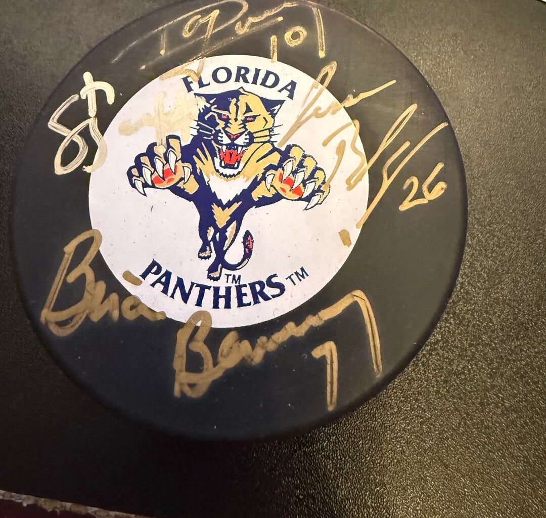 Had this puck signed by 6 players during inaugural year