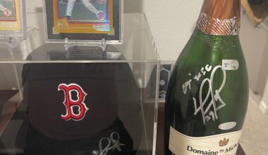07 World Series Signed Champagne bottle and game used hat signed from 2016 his last season!