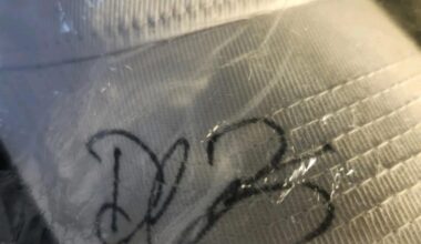 Coworker has a brother who bought a hat "from the Championship years". Anyone recognize the signature?