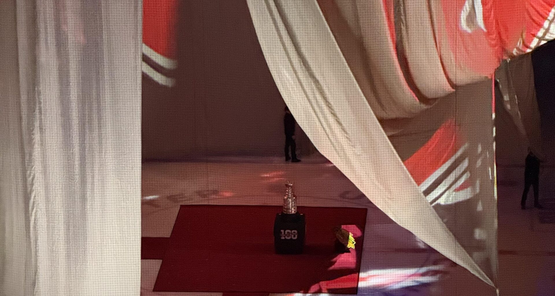 I wonder what is hiding behind the curtain?