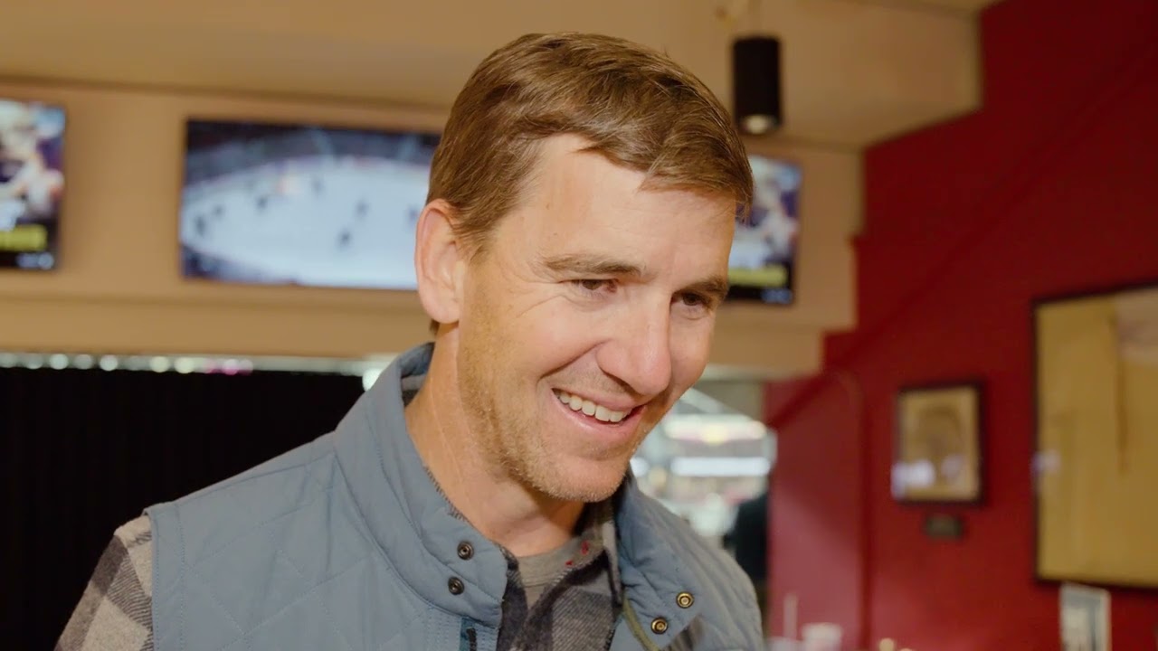 Eli Manning talks New Jersey Devils while watching them play in Ottawa.
