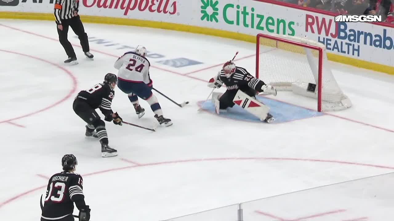 Mathieu Olivier scores a goal against the New Jersey Devils
