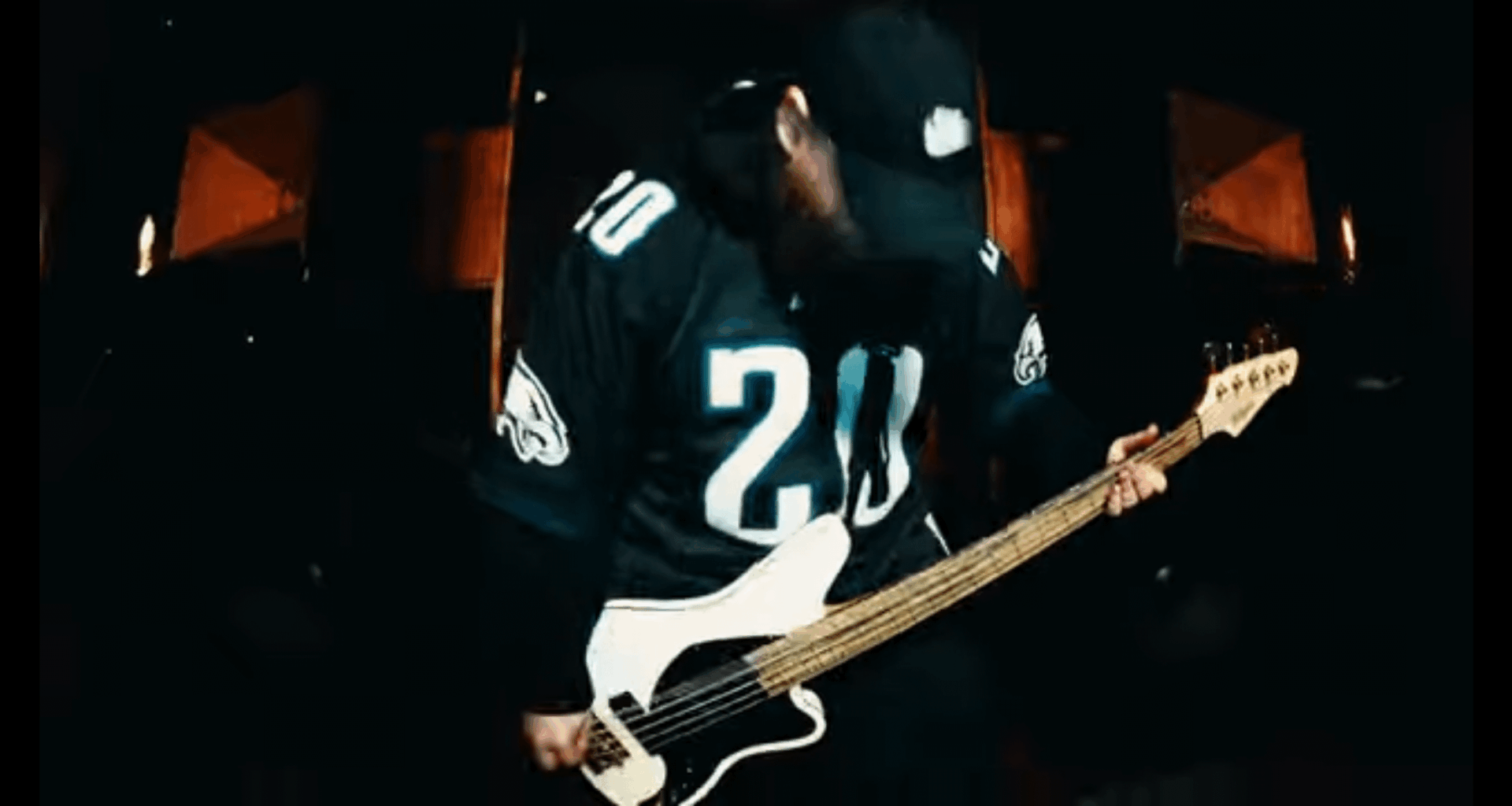 Kevin Otten rocking a Brian Dawkins jersey in the new Knocked Loose music video
