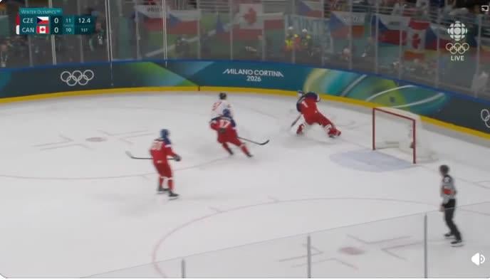 Celebrini tips a shot from Makar, and Canada takes the lead with 5.7 seconds to go in the first