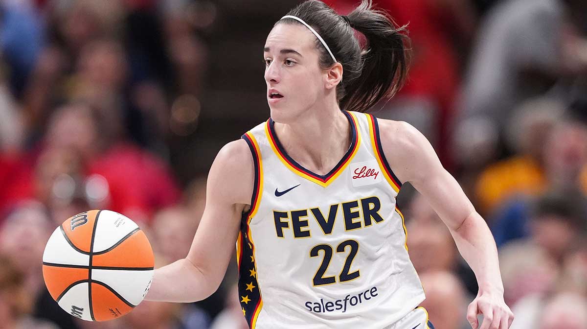 Indiana Fever guard Caitlin Clark (22) rushes up the court Friday, July 12, 2024, during the game at Gainbridge Fieldhouse in Indianapolis. The Indiana Fever defeated the Phoenix Mercury, 95-86.