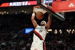 Portland Trail Blazers forward Toumani Camara dunks against the Philadelphia 76ers during the second half of an NBA basketball game, Monday, Feb. 9, 2026, in Portland, Ore.