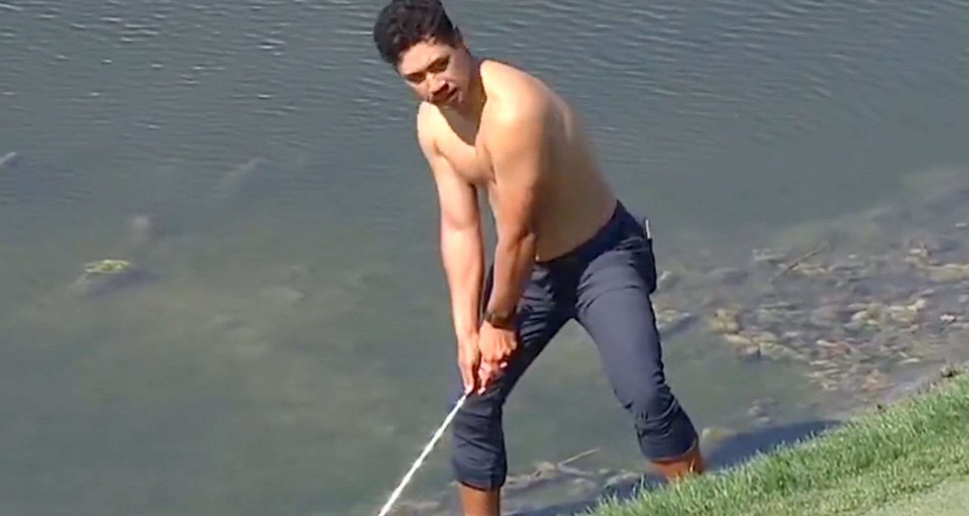Never-before-seen moment golf star strips to take shot as fans say ‘he just wanted to flex on everyone’