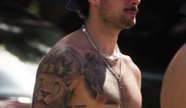 Chest tattoo says “The ultimate measure of a man is not where he stands in moments of comfort and convenience, but where he stands at times of challenge and controversy.” - Martin Luther King Jr