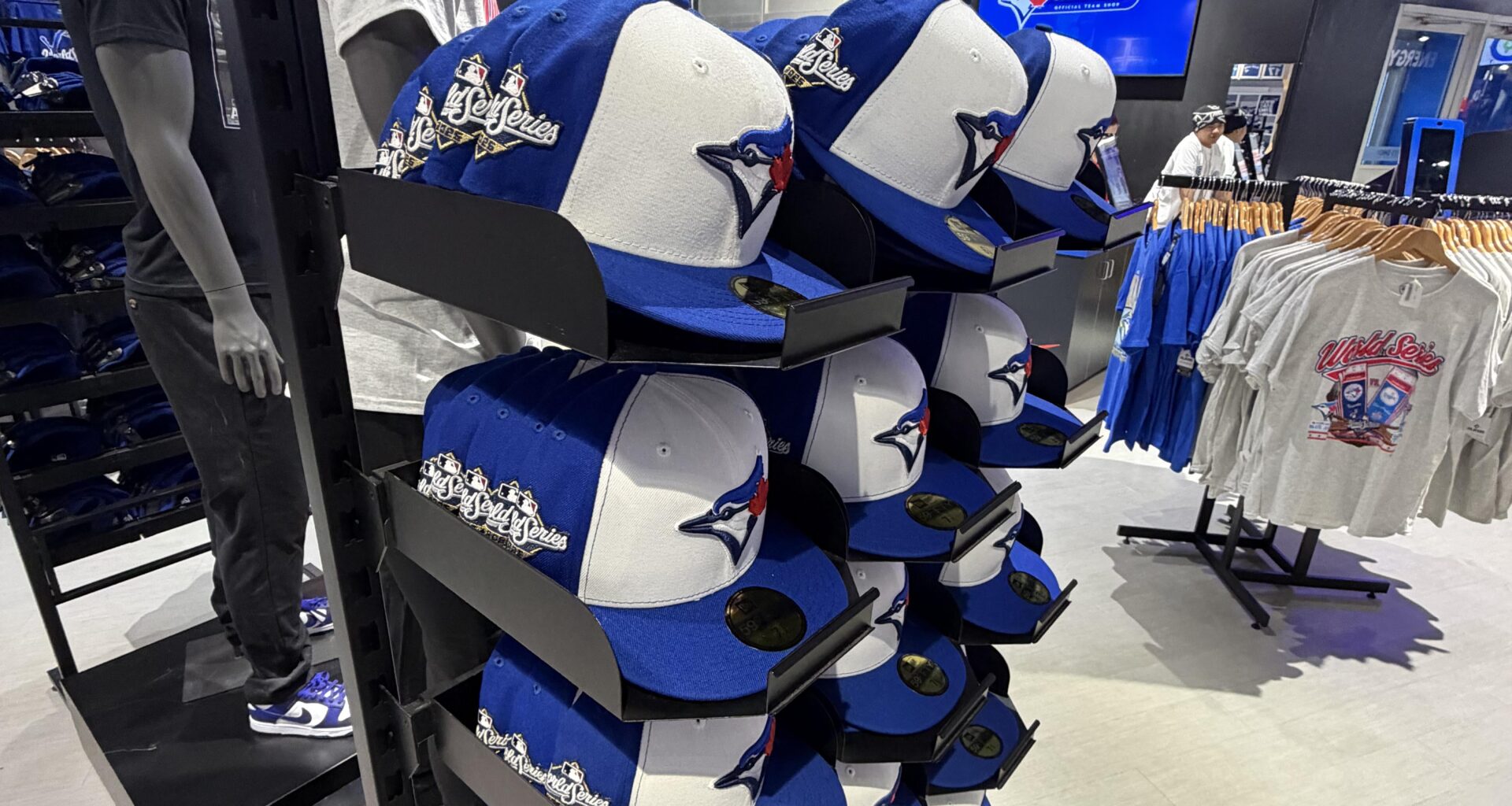 I remember people asking if they had any of the white panel World Series hats available. There’s plenty at the shop.