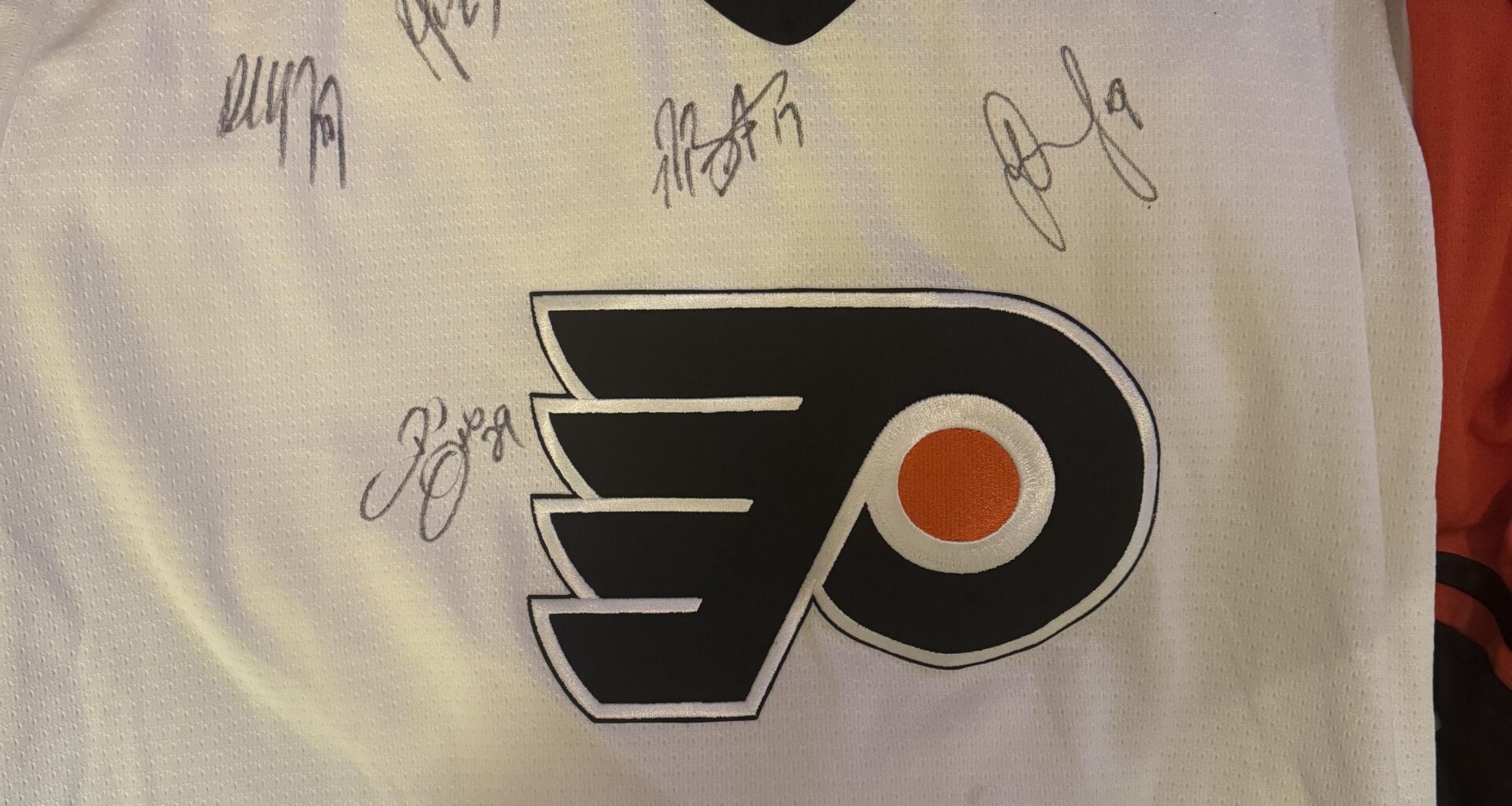 Girlfriend has this in her closet. Can anyone read the autographs?