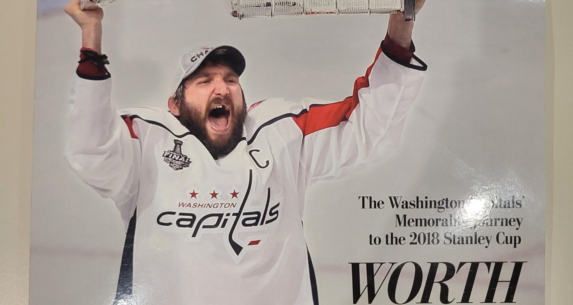 I bought "Worth the Wait", a compilation book of WaPo news articles chronicling the Caps' legendary Stanley Cup run.  Strangely, the season stages the articles were arranged in were put in reverse order, so that you could see the Finals first.