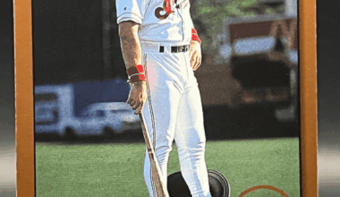 1996 Carlos Baerga: "Can you shoot me from below so I look taller?" Score photographer: "Not a problem!"