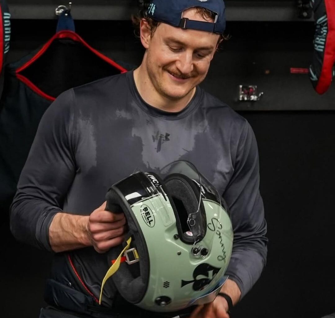 McMann is given the helmet by Melanson; updated leaderboard