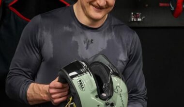 McMann is given the helmet by Melanson; updated leaderboard