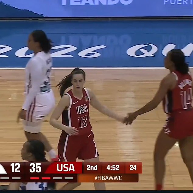 Clark had just dapped up another Team USA teammate before turning her back on Reese