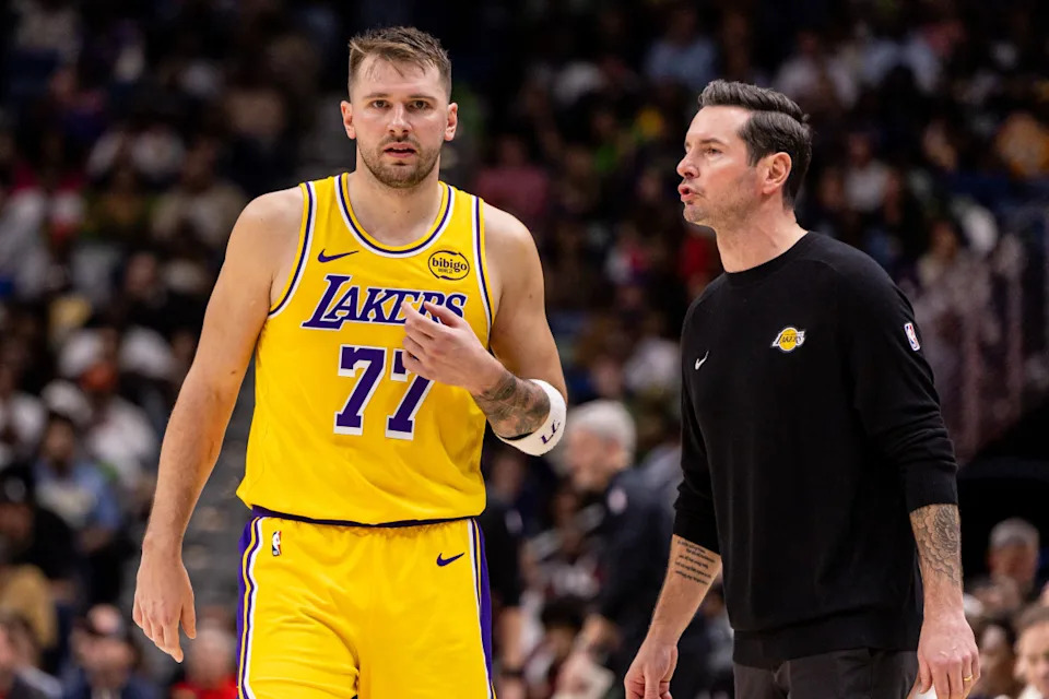 Los Angeles Lakers forward/guard Luka Doncic (77) talks to Head Coach JJ Redick against the New Orleans Pelicans.Stephen Lew-Imagn Images