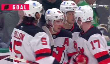 Jack Hughes scores a goal against the Dallas Stars