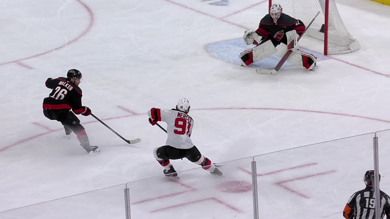 Timo Meier scores a goal against the Carolina Hurricanes