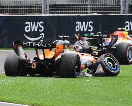 Oscar Piastri’s McLaren sits on the track after he crashed during the formation lap