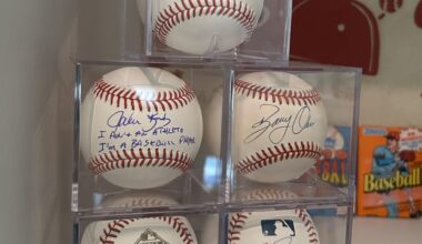 I was too oiled up yesterday to post, but I just scooped up a signed Kruk ball for the collection.